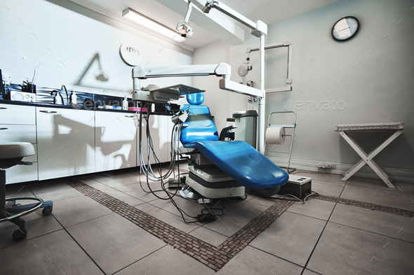 High end dental care with high end tech. .Shot of an empty modern dentists  office. Stock Photo by YuriArcursPeopleimages