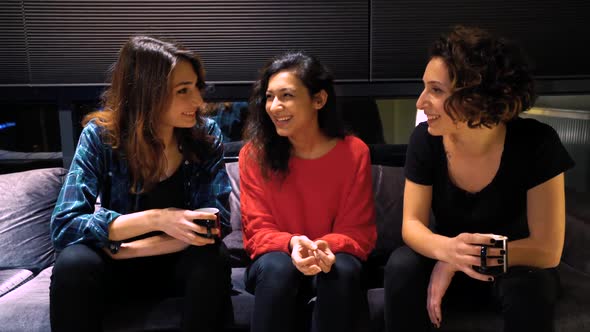 Three Happy Women Chatting alt