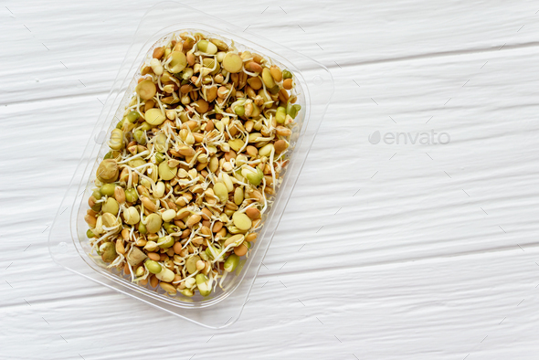 Healthy diet and vegetarian food. Mix of fresh sprouts on white background. macrobiotic food