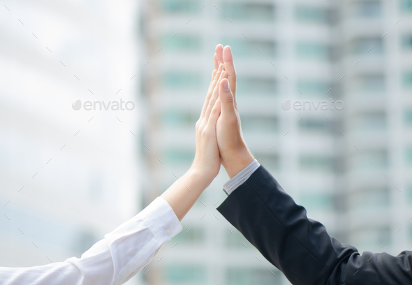business people palms clasped together