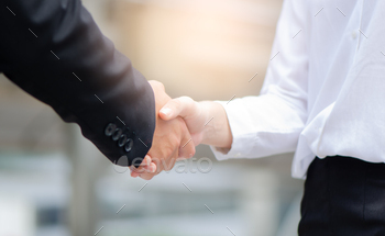 Business handshake agreement partnership after the meeting