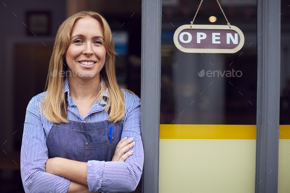 Portrait Of Female Owner Or Staff Standing Outside Shop Or Store With Open Sign - Stock Photo - Images