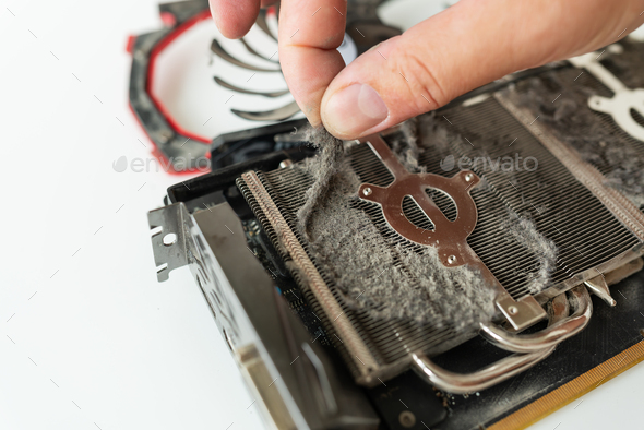 Cleaning the video card of the computer from dust. Computer maintenance and care.
