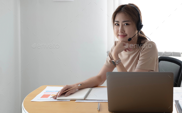 Video call camera view of businesswoman talks actively in videoconference . Call center