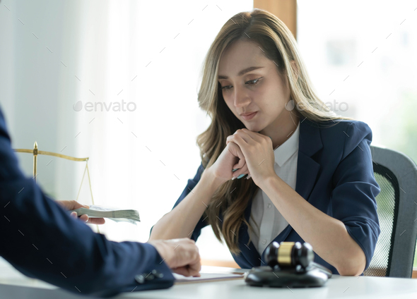 A professional asian female lawyer or business legal consultant having a secret meeting with her