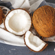 Pile of broken coconuts on ripped grey background - PhotoDune Item for Sale