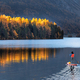 On paddleboard in mountain lake in autumn - PhotoDune Item for Sale