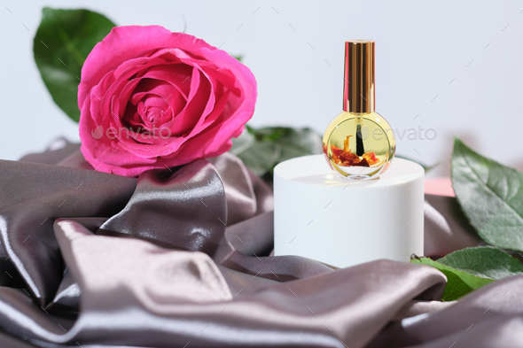 cuticle care with rose petal oil. hands and nail care and wellness. beauty treatment at home