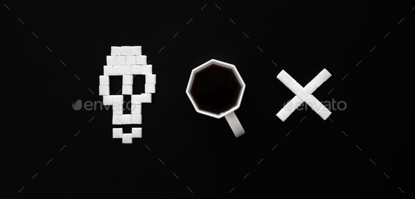 Skull bones from sugar and cup of coffee on black background, flat lay.