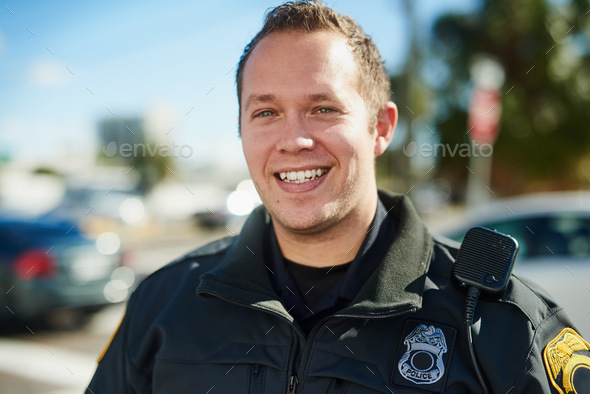 Its my duty to serve and protect. Cropped portrait of a handsome young policeman out on patrol.