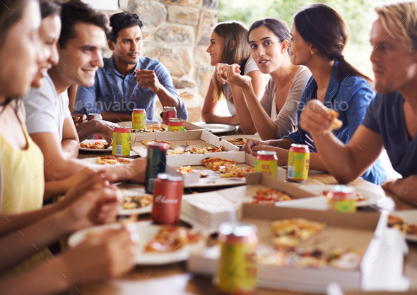 Theres pizza for all. Cropped shot of a group of friends enjoying pizza together.