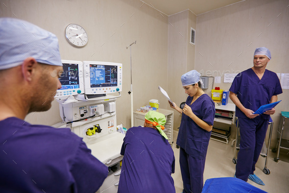Experts in saving lives. Shot of a team of surgeons preparing for a surgery.