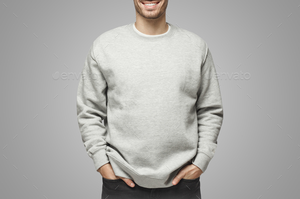 No face photo of man in sweatshirt, standing isolated on gray background