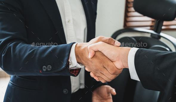 Businessman handshake for teamwork of business merger and acquisition,successful negotiate, two - Stock Photo - Images