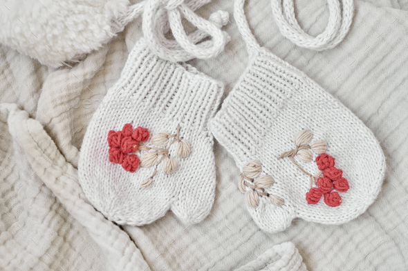 Knitted mittens with embroidery. Kids clothes and accessories. Knit for children. Handmade