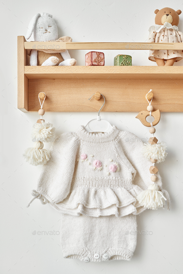 Knitted dress with embroidery, kids clothes and accessories. Knit for children. Handmade