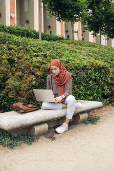 Muslim Woman Using Laptop