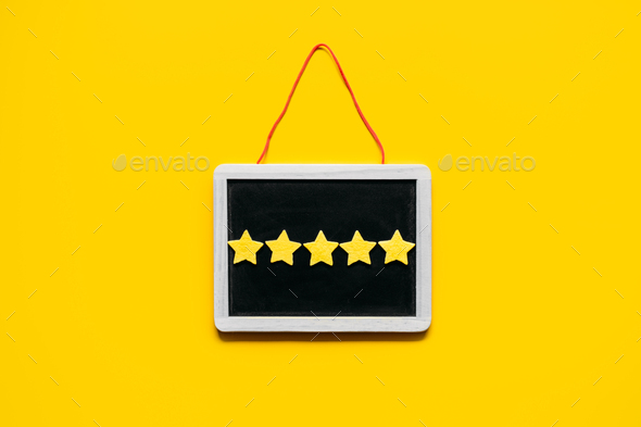 Customer Experience, Review Concept. Five yellow stars excellent rating in frame on yellow - Stock Photo - Images