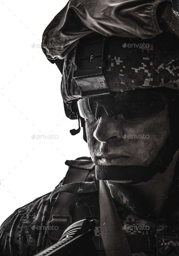Equipped army soldier with dirty face - Stock Photo - Images