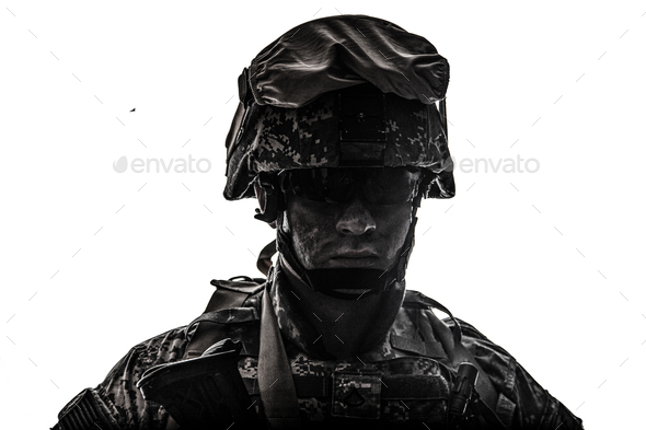 Equipped army soldier with dirty face - Stock Photo - Images