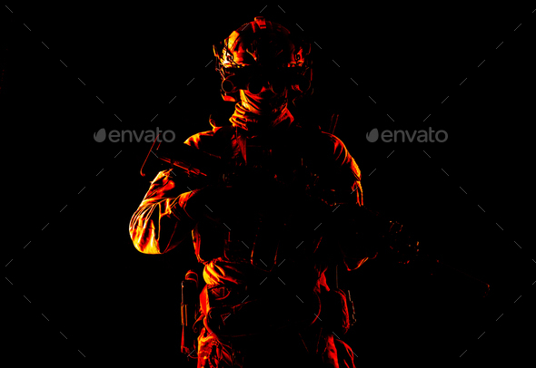 Army special forces fighter low key studio shoot - Stock Photo - Images