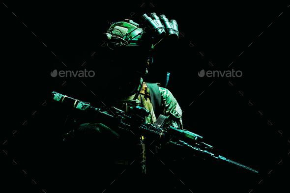 Army special forces shooter low key studio shoot - Stock Photo - Images