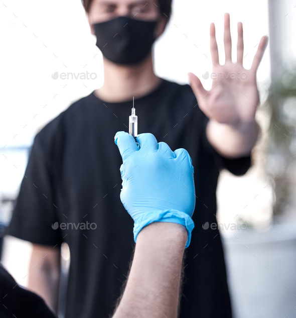 This is a violation of my rights. Shot of a man boycotting the covid 19 vaccine.