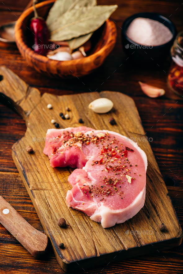 Pork loin steak with ground spices Stock Photo by Seva_blsv PhotoDune