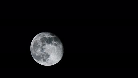 Full Moon Moves in the Dark Night Sky Orbiting Earth, Time-lapse alt