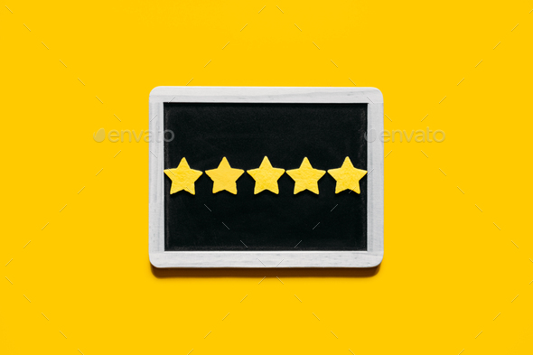 Customer Experience, Review Concept. Five yellow stars excellent rating in frame on yellow - Stock Photo - Images