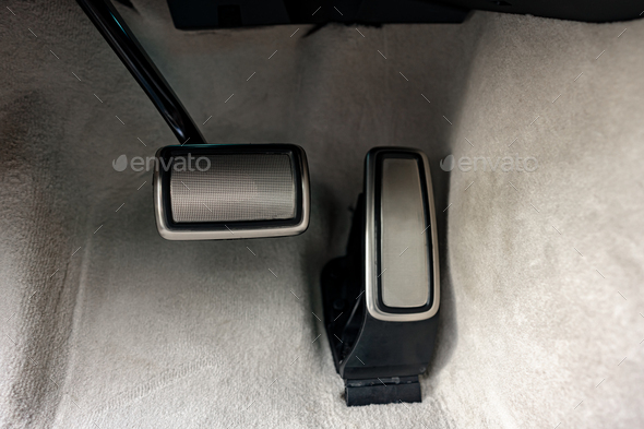 Brake and gas pedals of a luxury car
