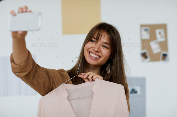 Bragging of new blouse to friend