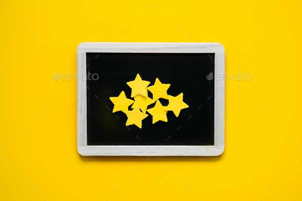 Customer Experience, Review Concept. Many yellow stars Negative Online Reviews rating in frame on - Stock Photo - Images