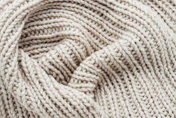 Knitting. Vertical striped beige knit fabric texture, knitted pattern background. Top view - Stock Photo - Images