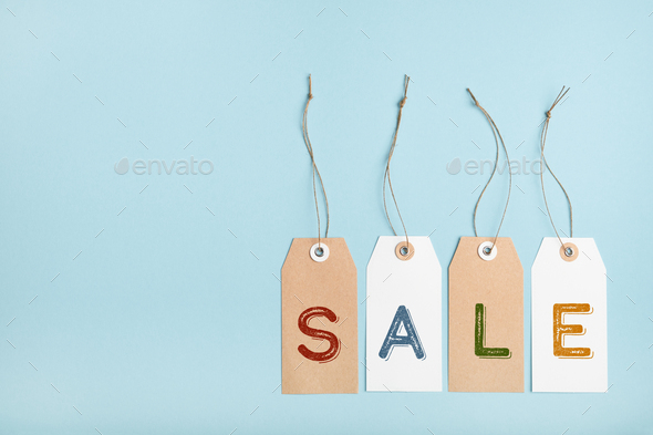 Set of tags with word SALE on a blue background. Seasonal discounts in stores - Stock Photo - Images