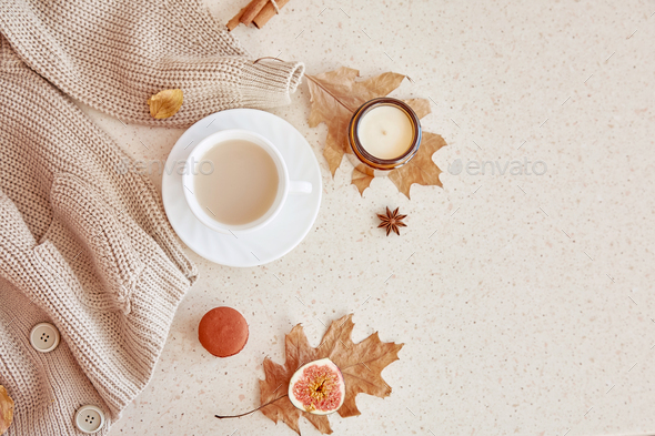 Pastel aesthetic autumn background - casual woman sweater. Aesthetic feminine coffee time