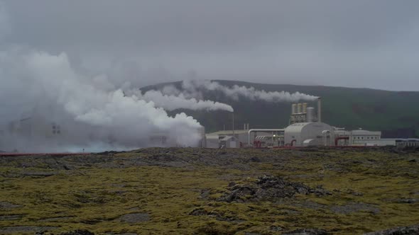 volcanic iceland landscape, blue lagoon area, smoking svartsengi power plant, medium telephoto lens alt