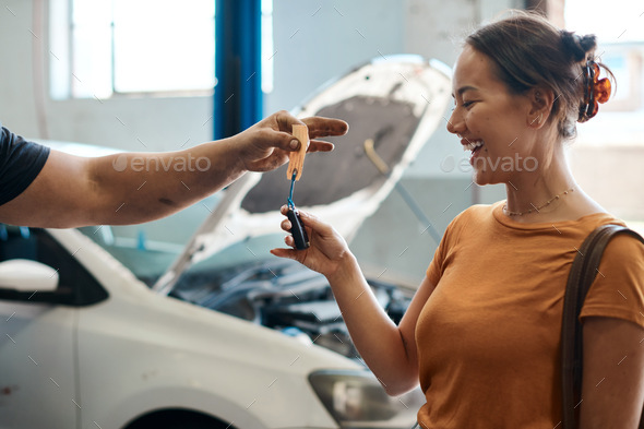 As always, drive safely. Shot of a woman receiving her car keys.