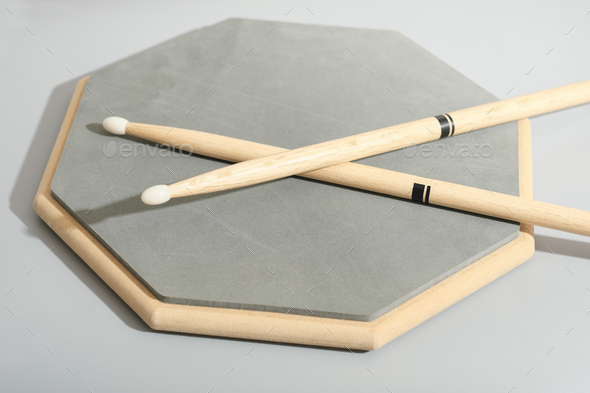 Percussion Instruments Music School, training pad and drumsticks. learning music, music education.
