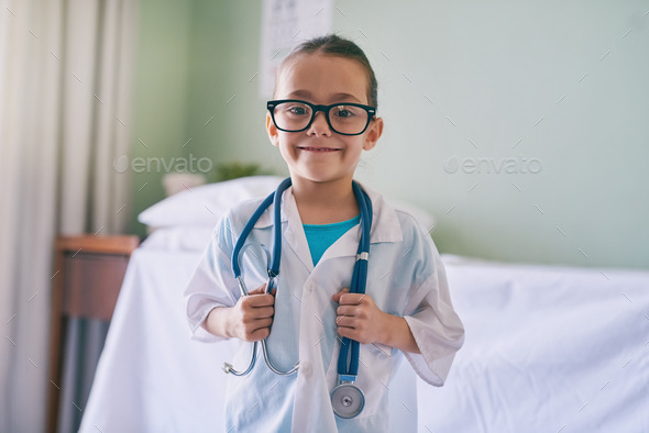 I want to help people feel better. Cropped shot of an adorable little girl dressed as a doctor.