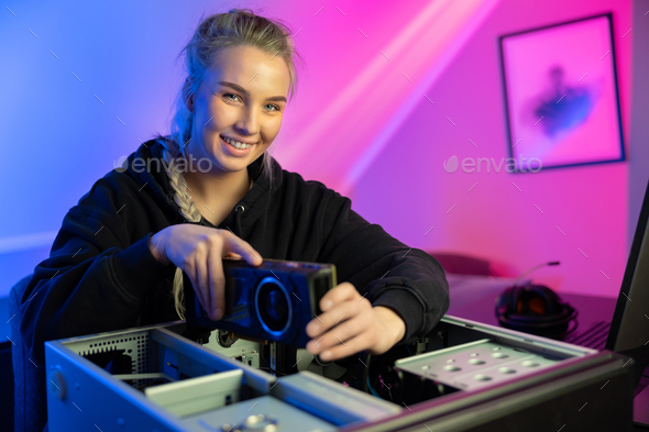 Happy and Beautiful Blonde Gamer Girl Playing Online Video Game on Her  Personal Computer Stock Photo by kjekol