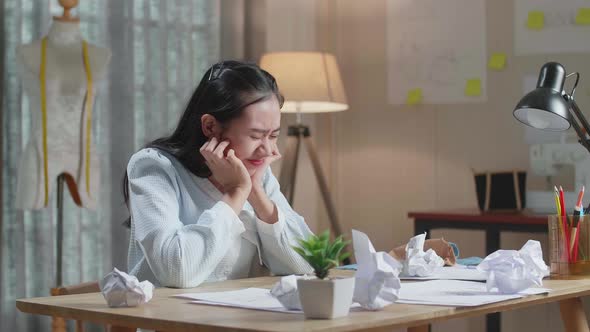 Asian Woman Designer Is Upset Failing Drawing On The Layout Bond And Throw It Away alt