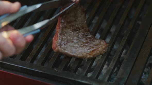 Cooking Steak on a Hot Grill