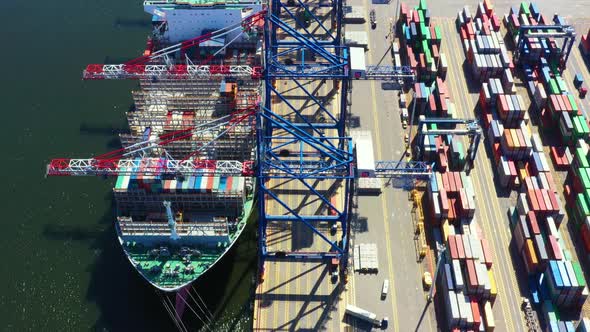 Container ship from sea port working for delivery containers shipment and container warehouse backgr alt