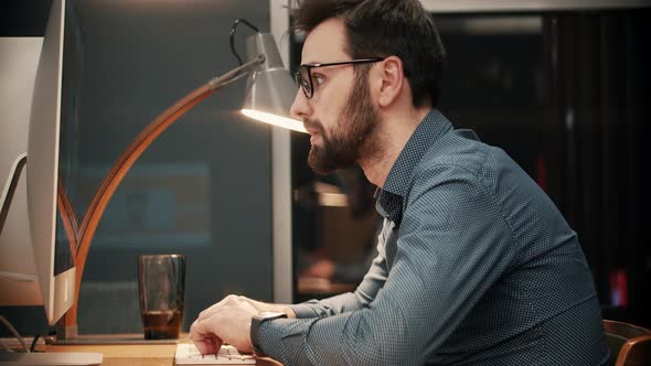 Graphic Designer Overworked On Computer Webinar. Workaholic On Pc Overtime Deadline alt