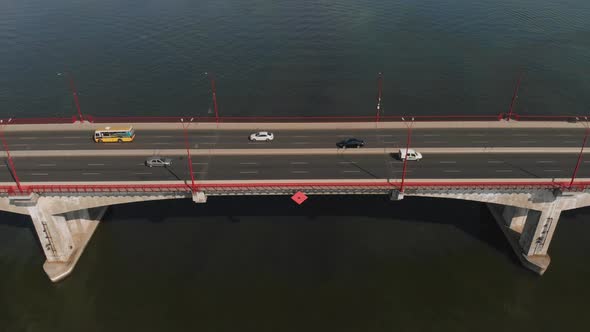 Aerial view of highwayroad with moving cars. Road traffic city. Highway road Bridge. alt