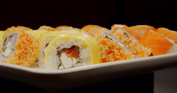 Sushi .Rolls With Different Fillings Inside. Japanese Cuisine