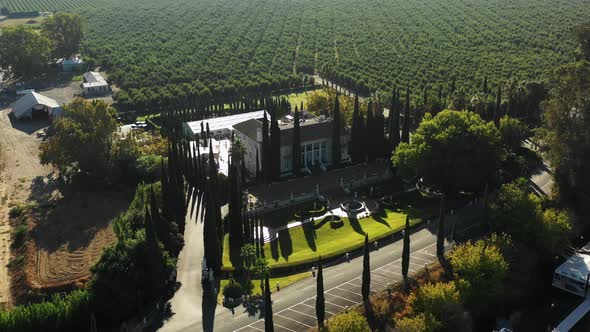 High orbit aerial of Grand Island Mansion wedding venue near Sacramento alt