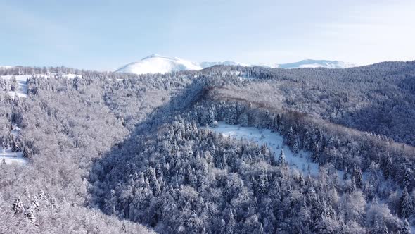 4K Drone footage over mountain and forest alt