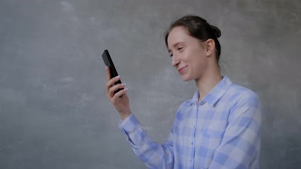 Woman Using Smartphone, Having Video Chat, Interview or Consultation
